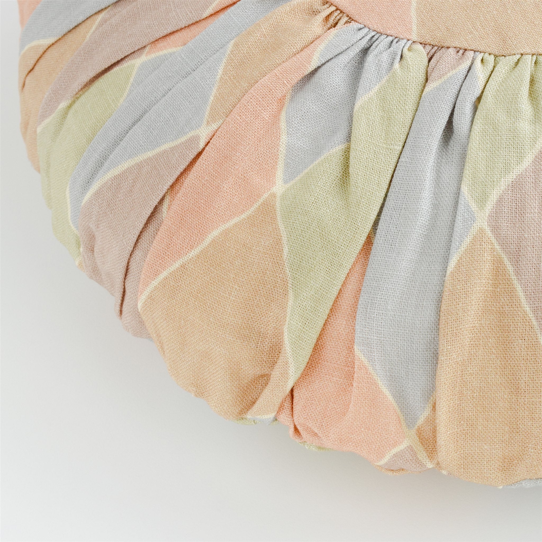 Harlequin round cushion, macaron
