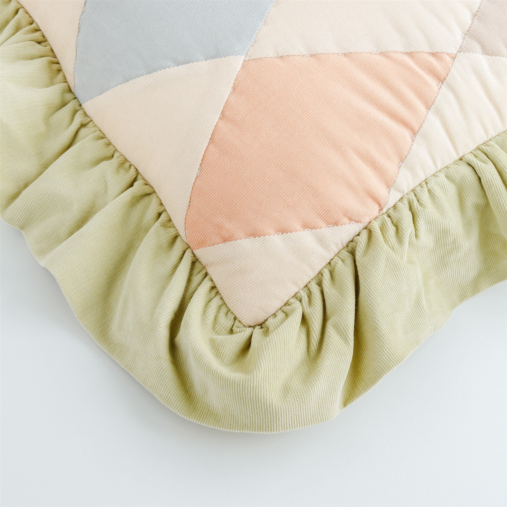 Harlequin cord cushion, macaron