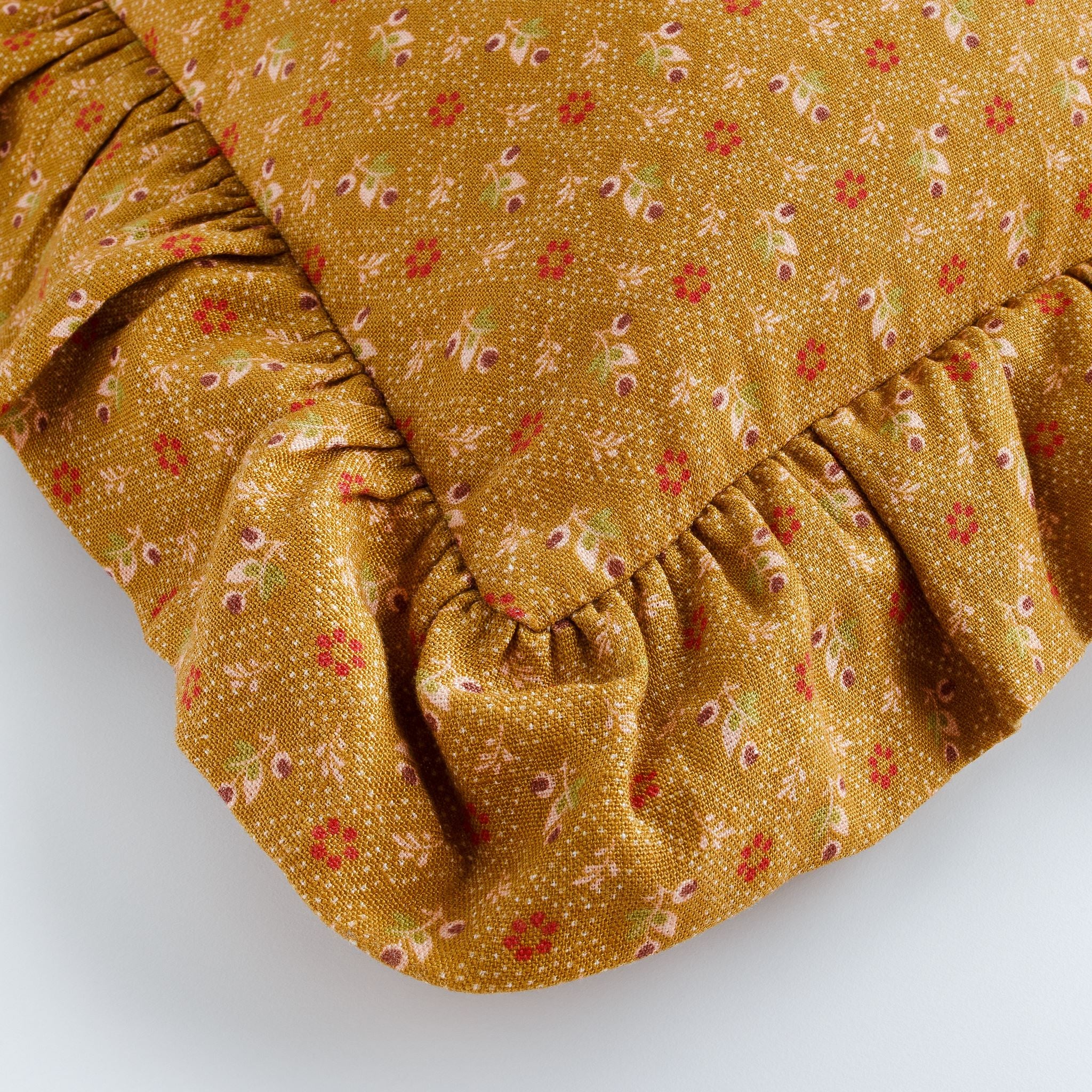 Tähti square frill cushion, turmeric