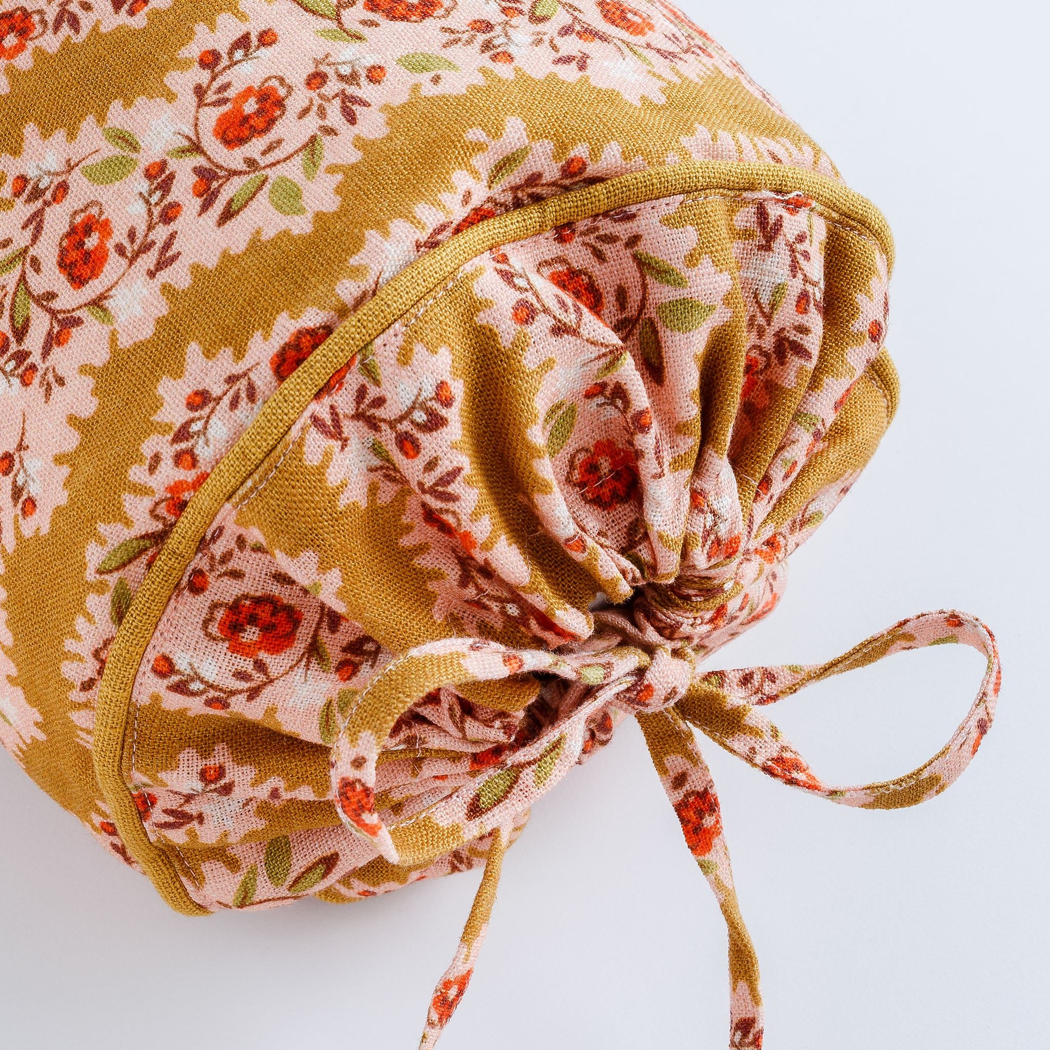 Hedgerow stripe bolster cushion, turmeric