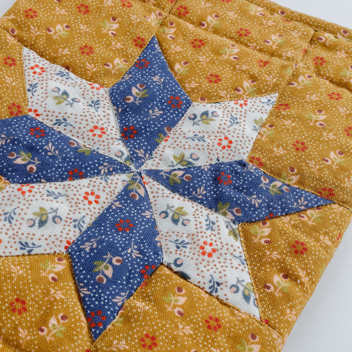Tähti patchwork Christmas stocking, turmeric