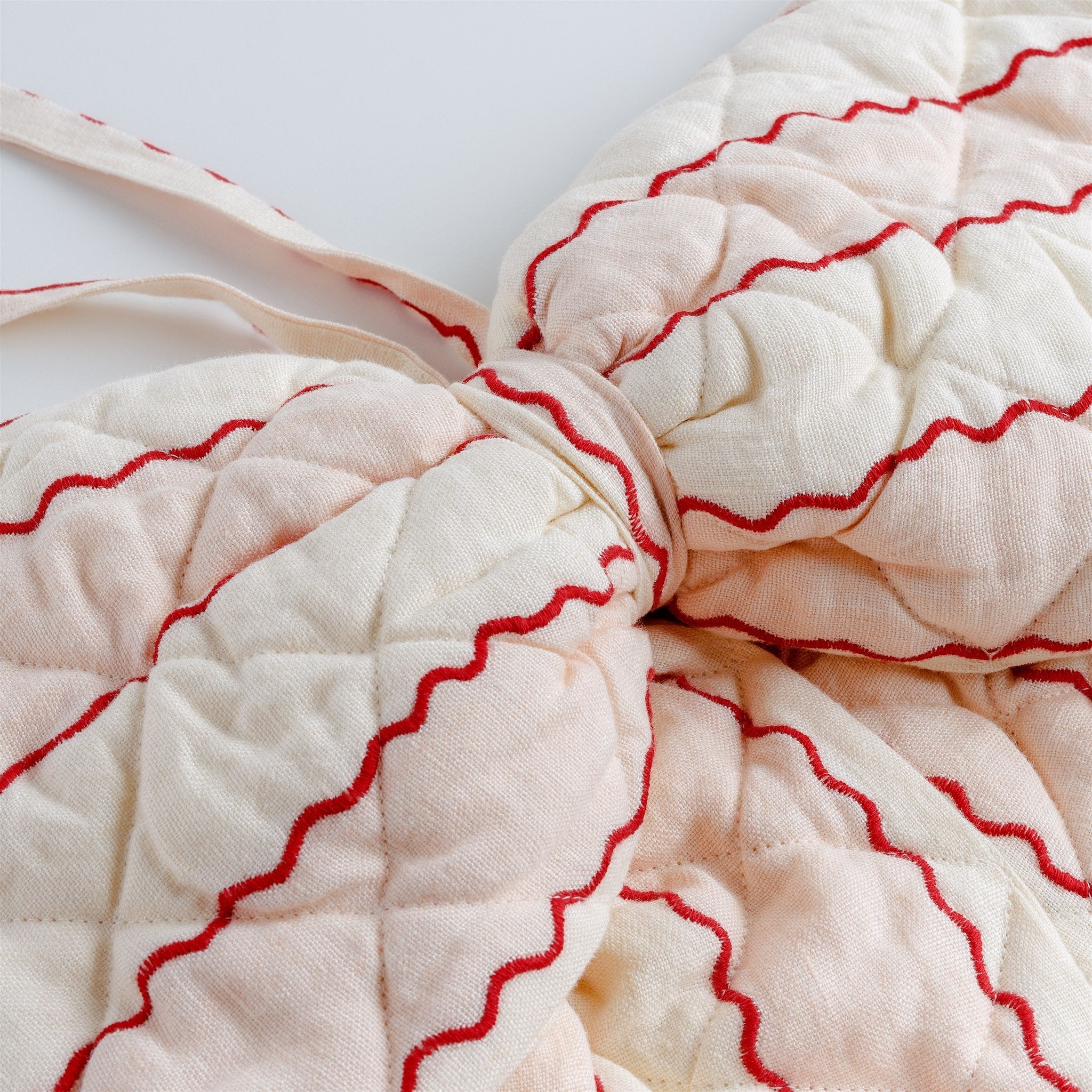 Marionette stripe embroidered quilted bow, pink