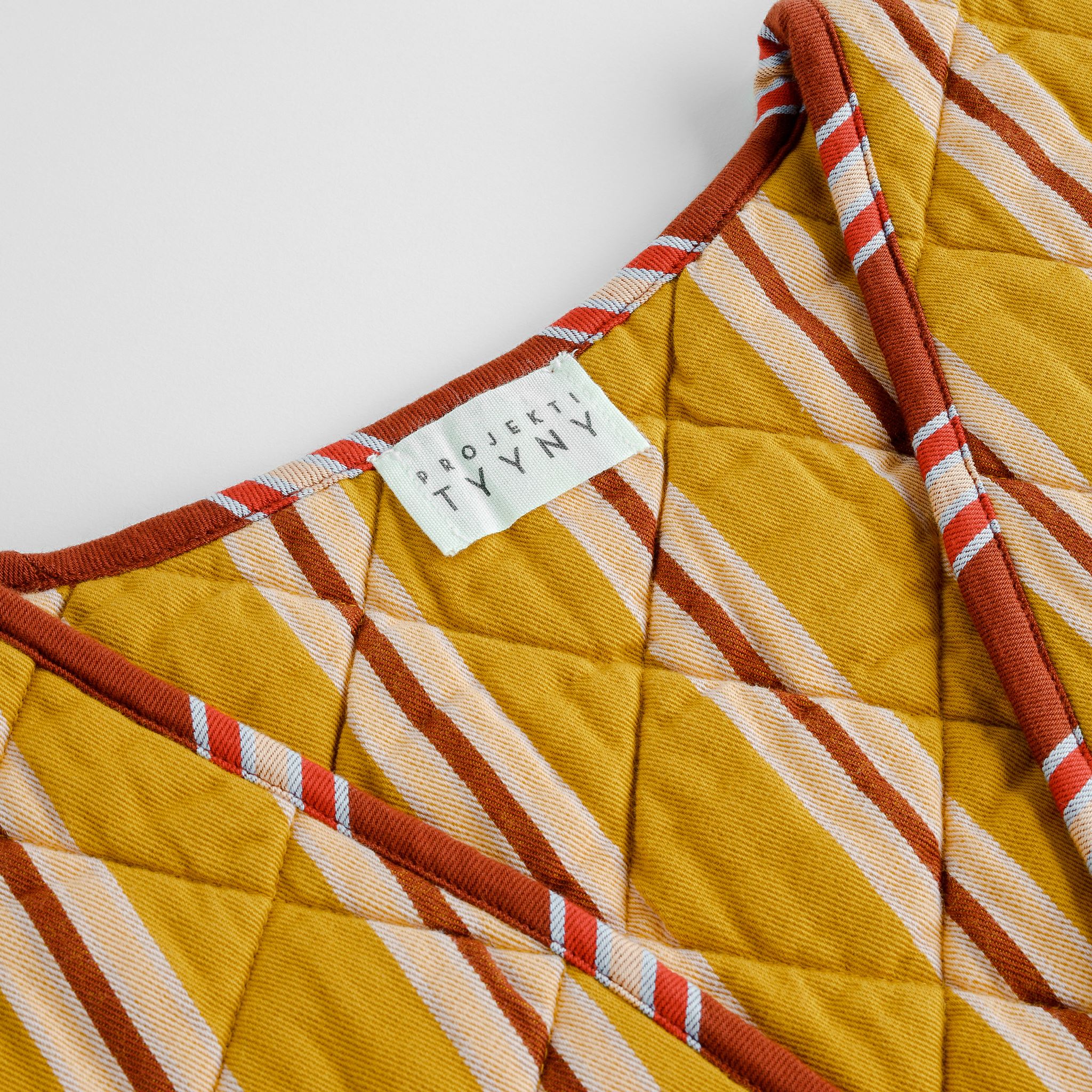 Turmeric pop stripe quilted waistcoat