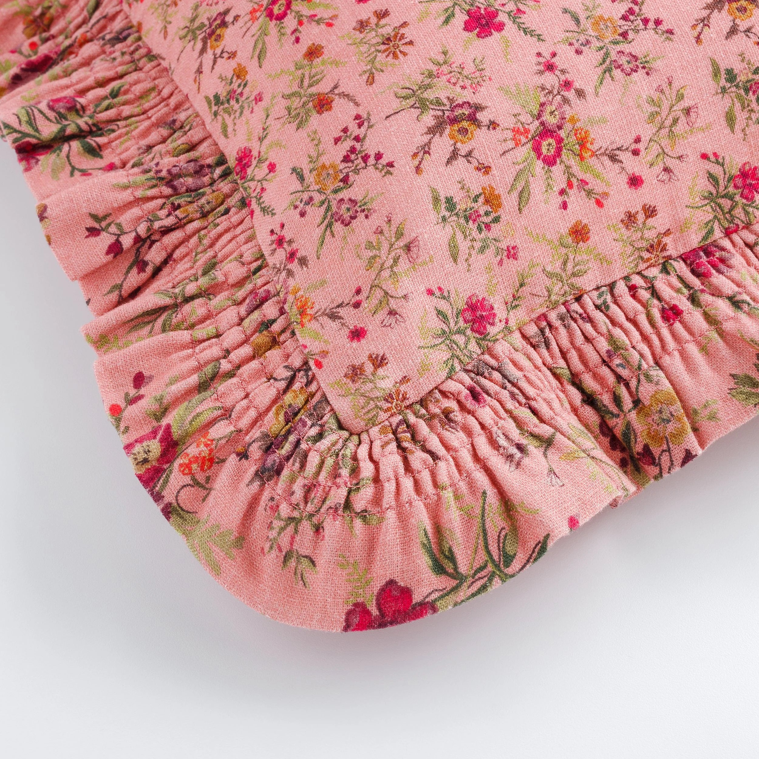 Prairie floral smocked frill cushion, peony