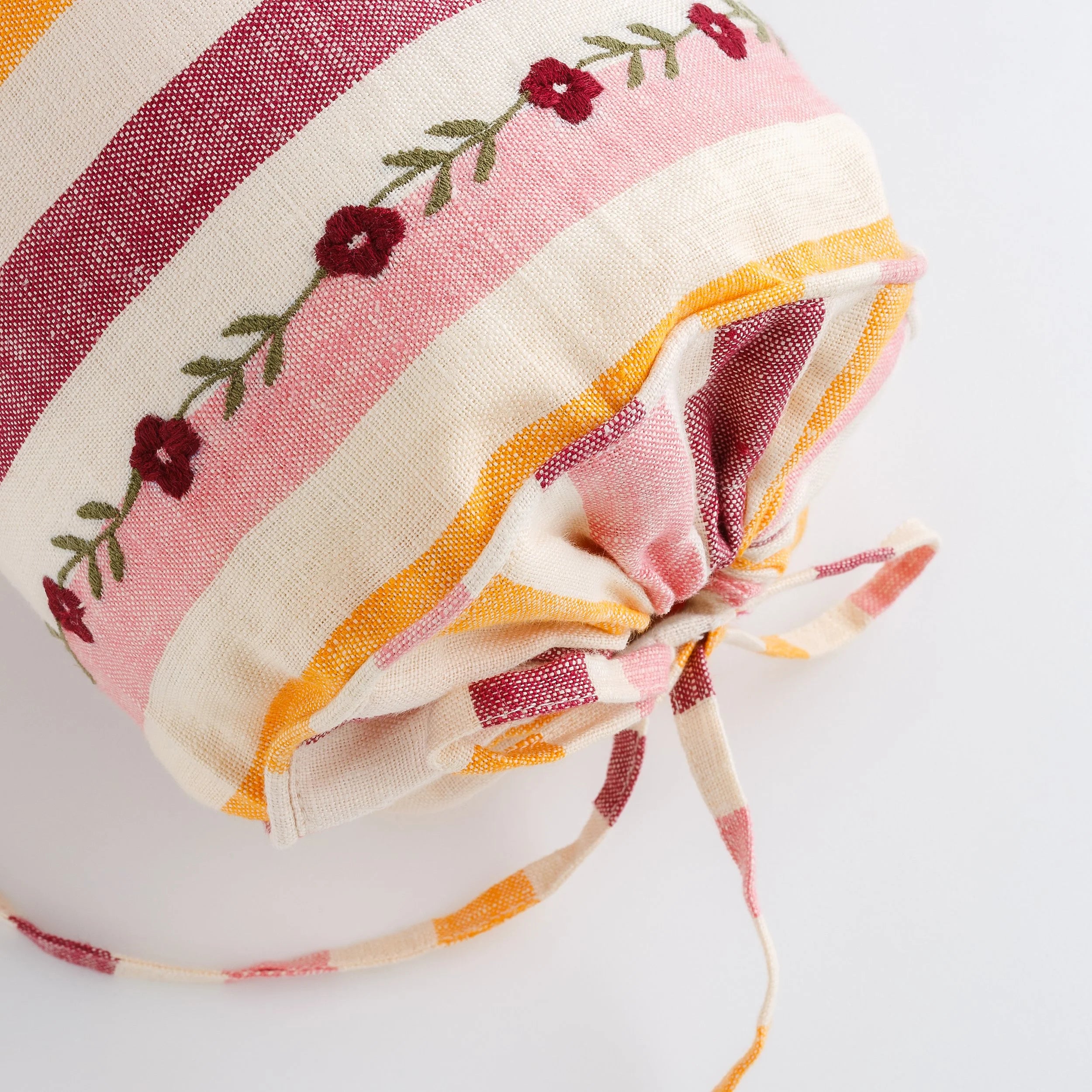 Candy striped embroidered bolster cushion, claret