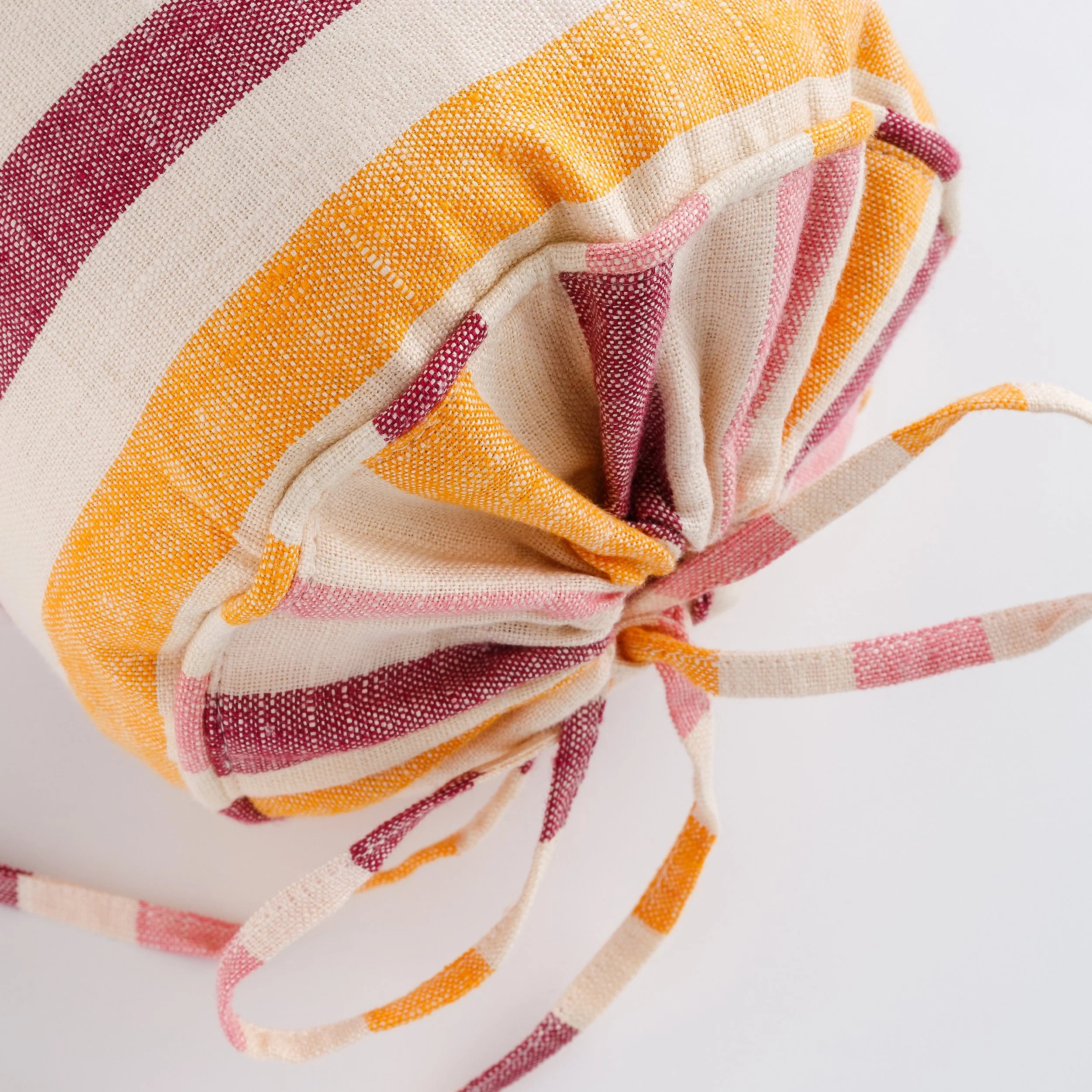 Candy striped bolster cushion, claret