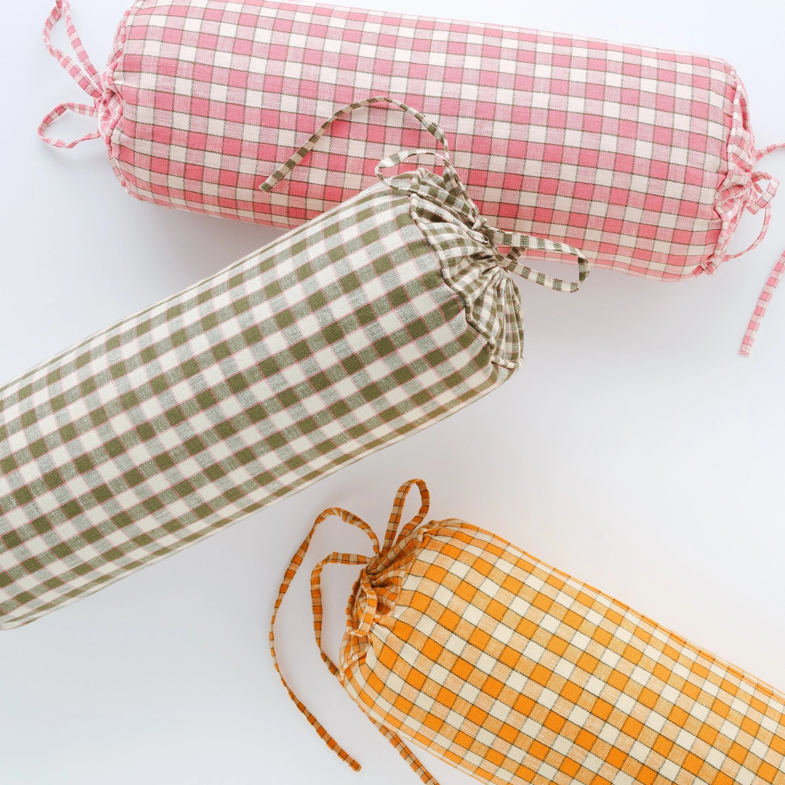 Gingham bolster cushion, apricot