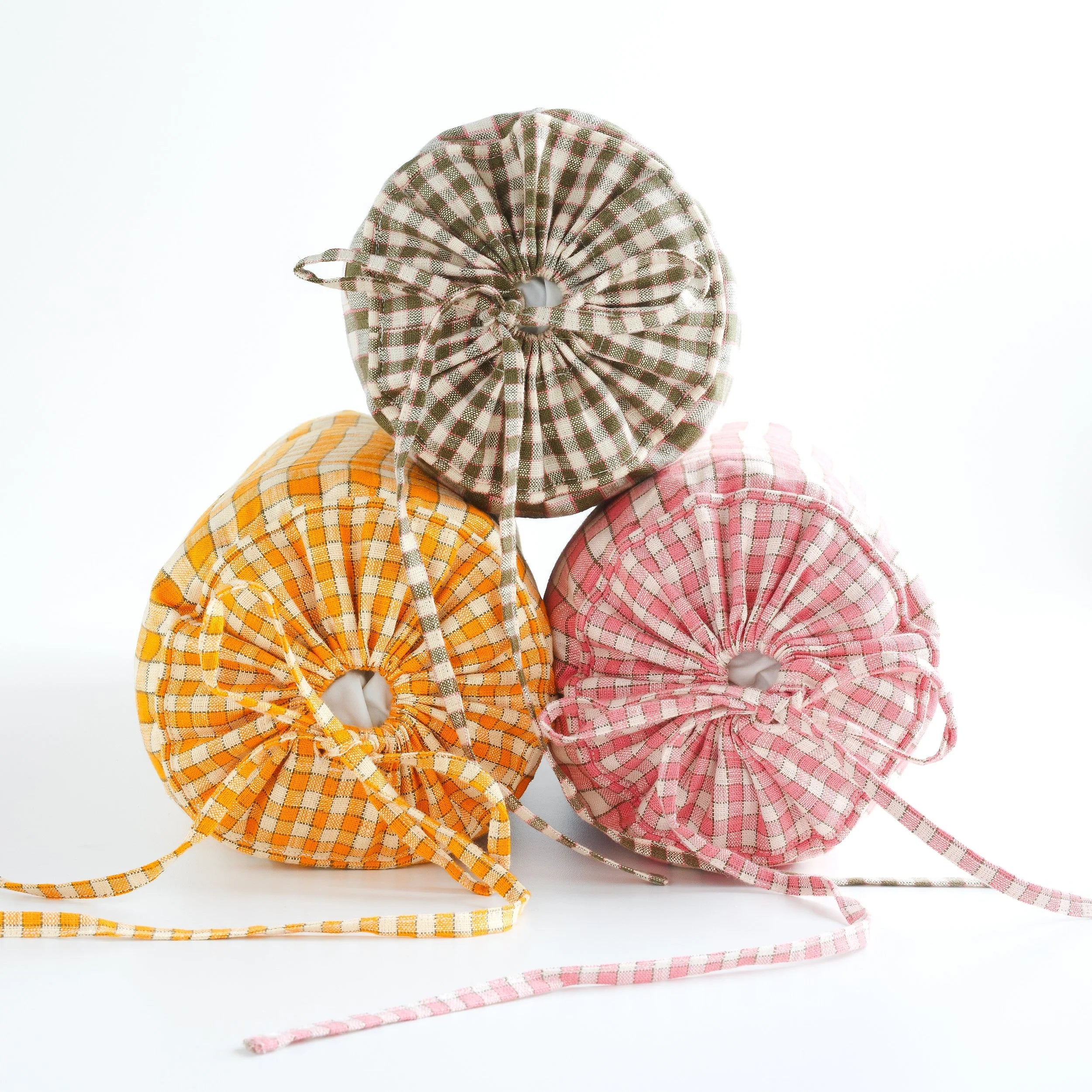 Gingham bolster cushion, apricot