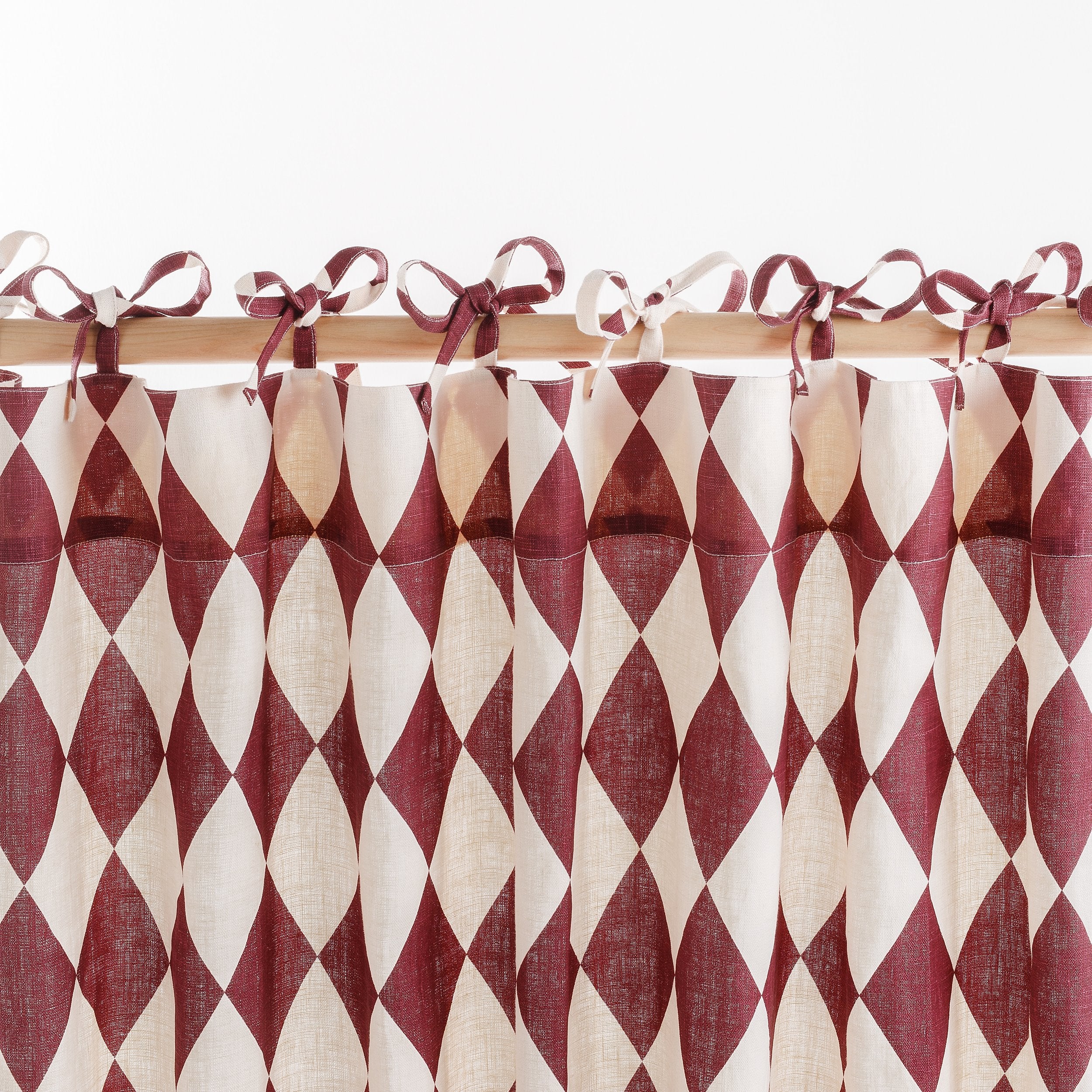Harlequin linen curtains, a pair in a bag, claret/cream