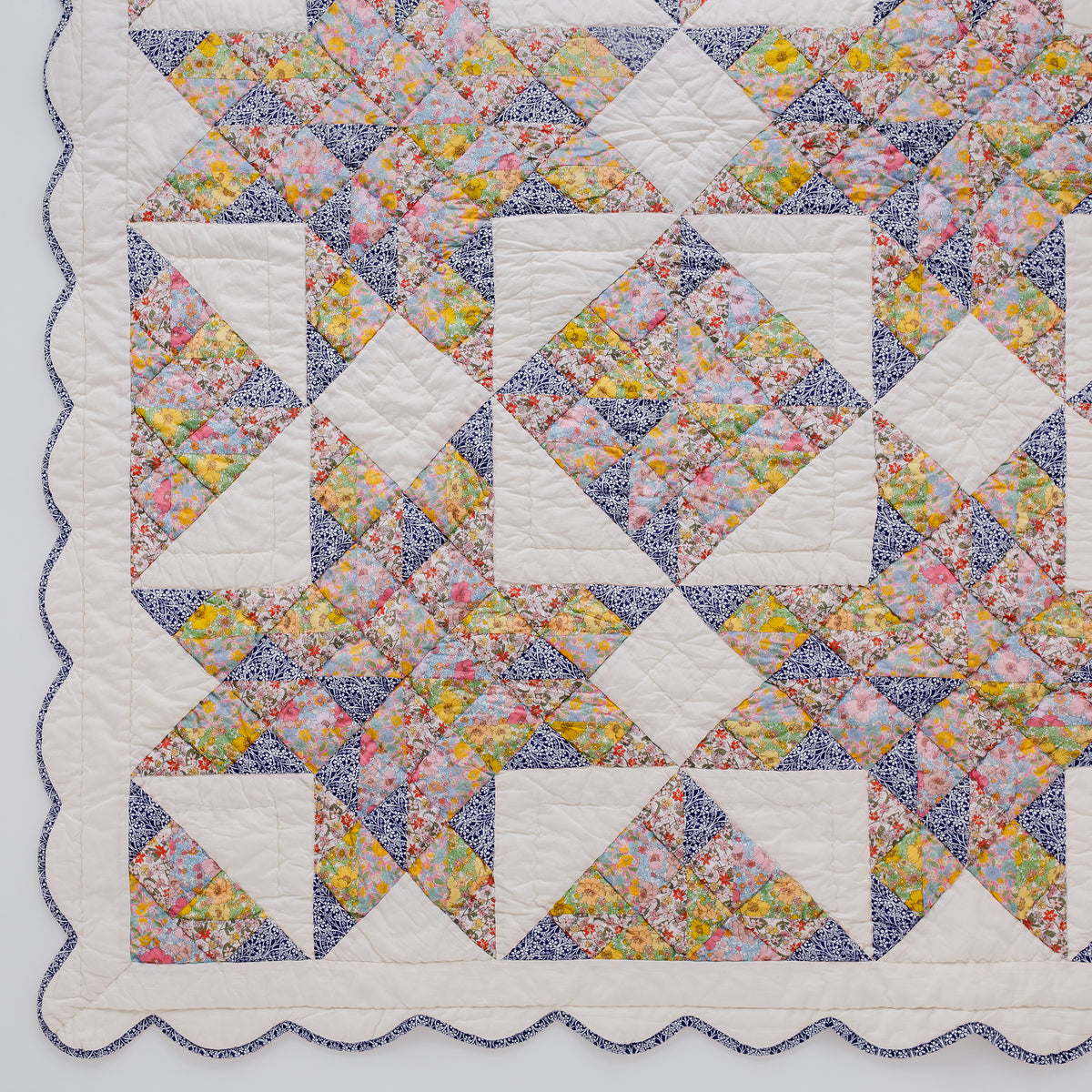 Patch of Paradise, made with Liberty fabrics, patchwork quilt, navy