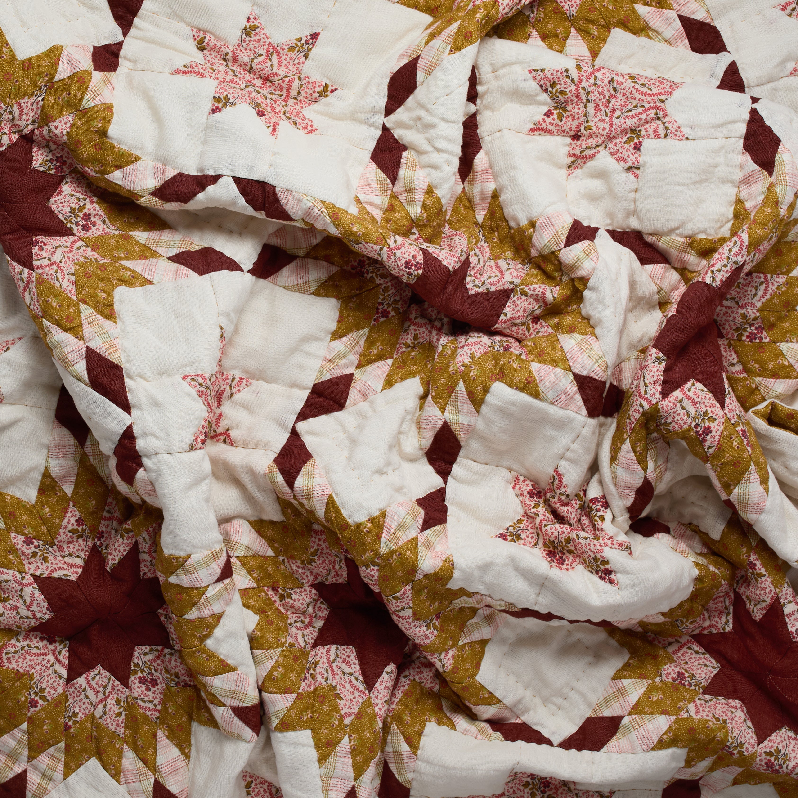 Harvest Star patchwork quilt, turmeric