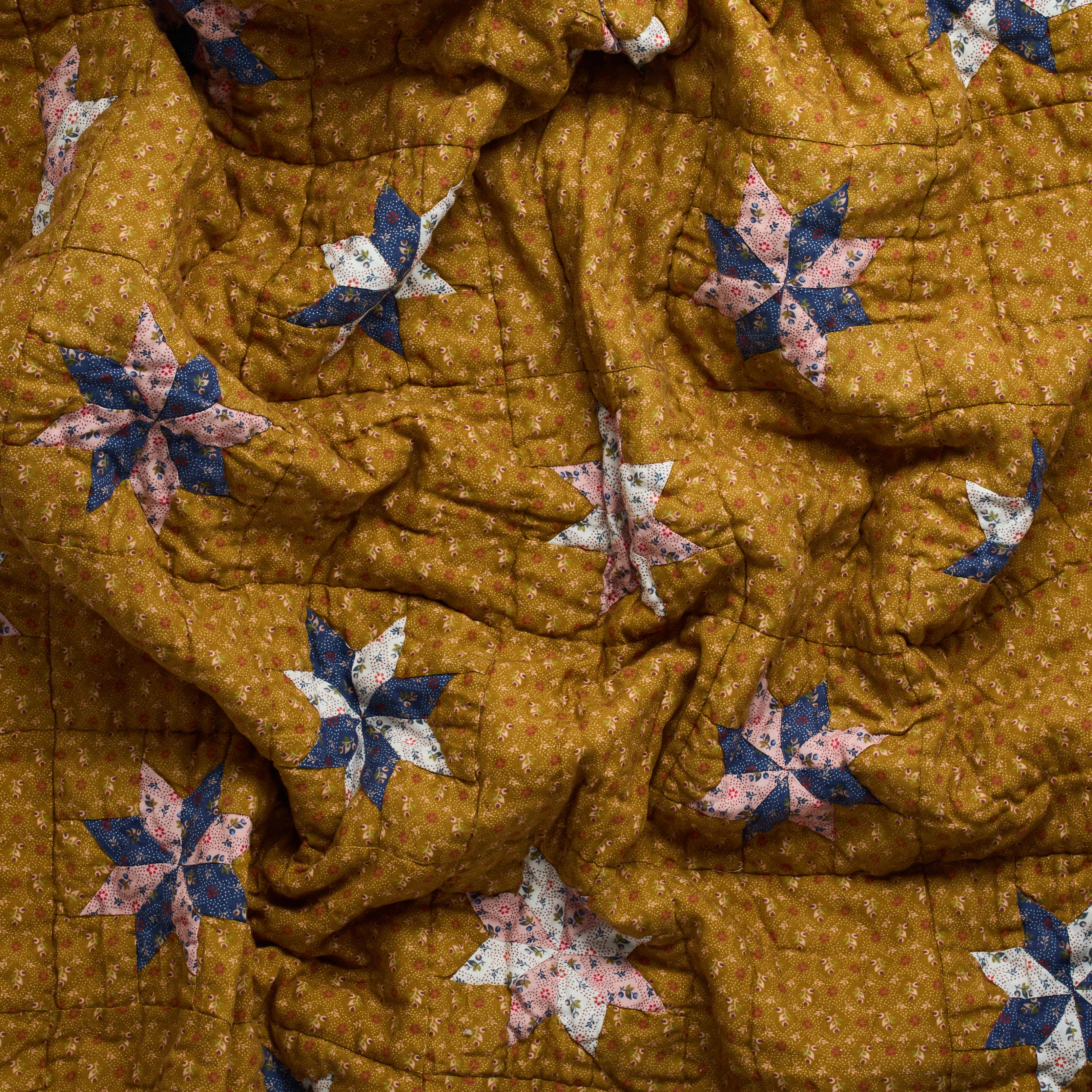 Tähti patchwork quilt, turmeric