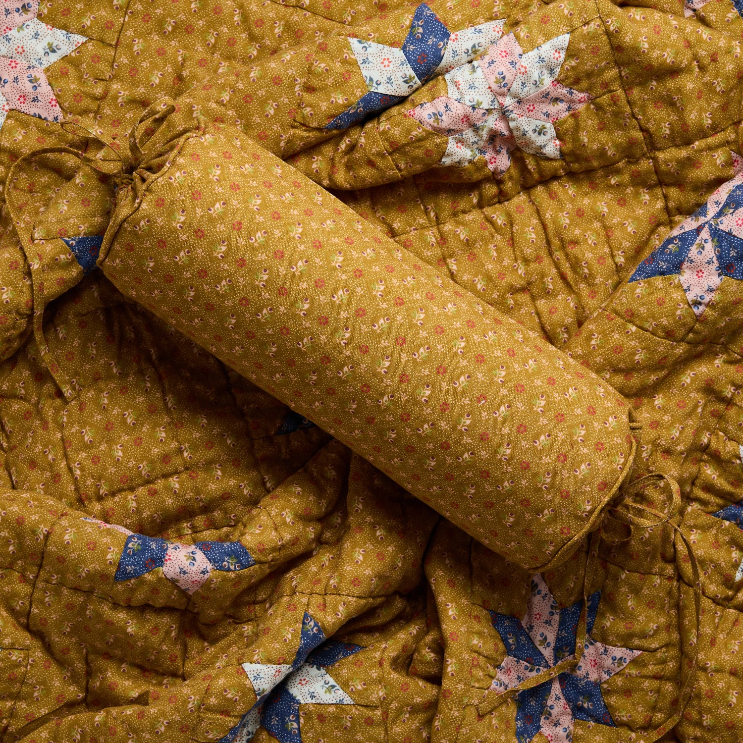 Tähti bolster cushion, turmeric