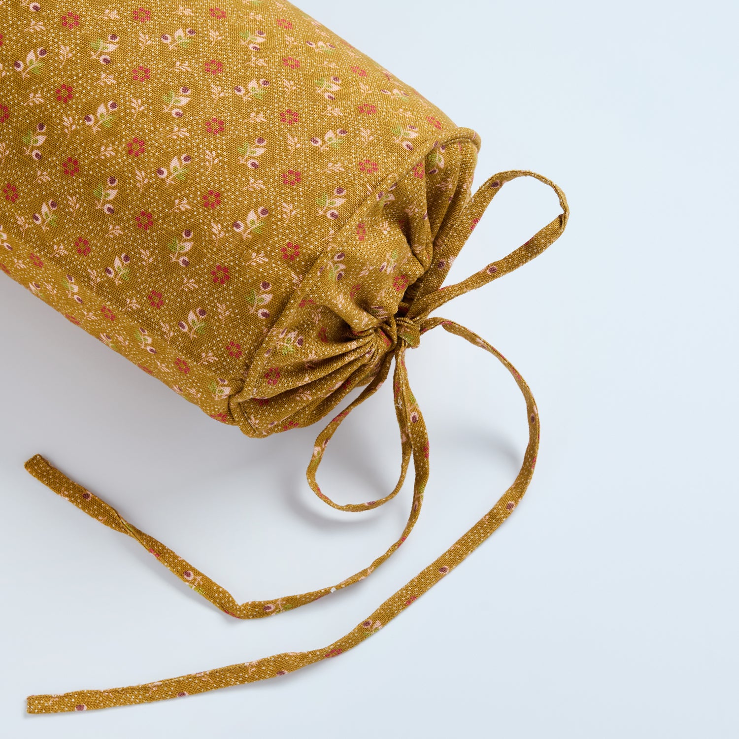 Tähti bolster cushion, turmeric