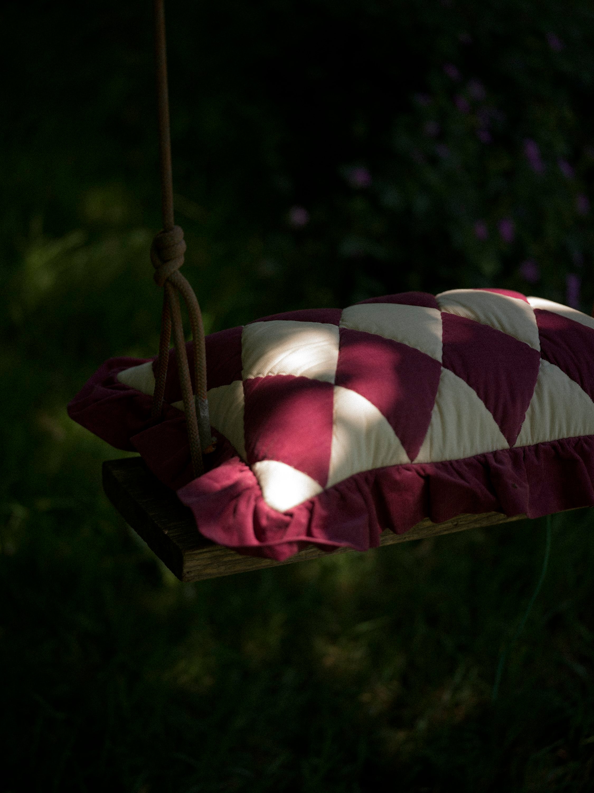 Harlequin cord cushion, claret/cream