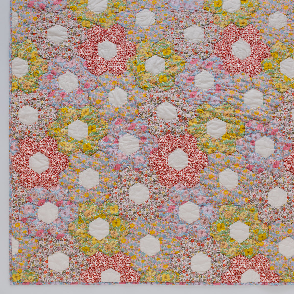 Petit Posy, made with Liberty fabrics, patchwork BABY quilt